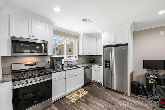 kitchen with white cabinets, sink, and stainless steel appliances