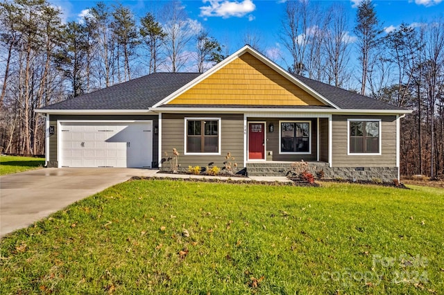 single story home with a garage and a front yard