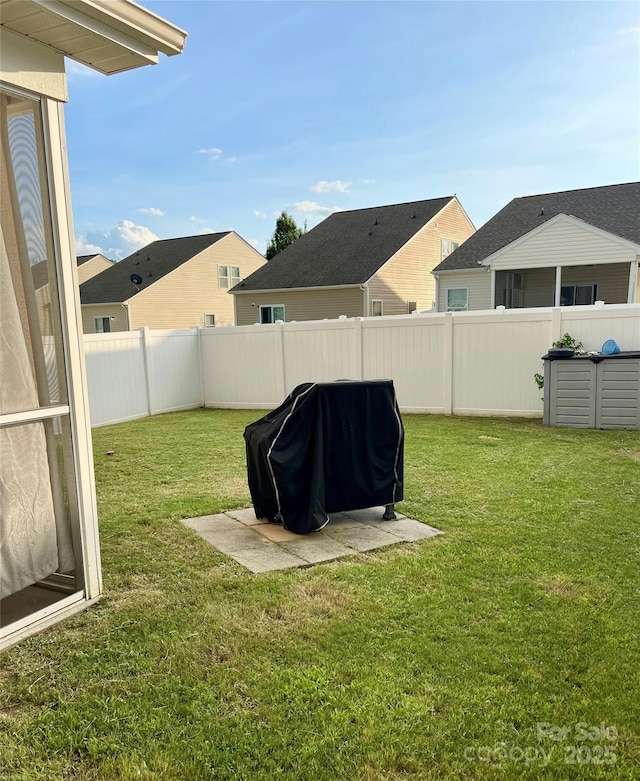 view of yard featuring a fenced backyard