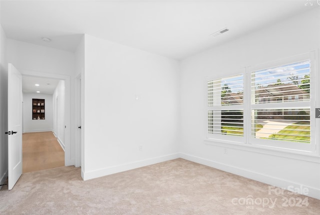 view of carpeted spare room