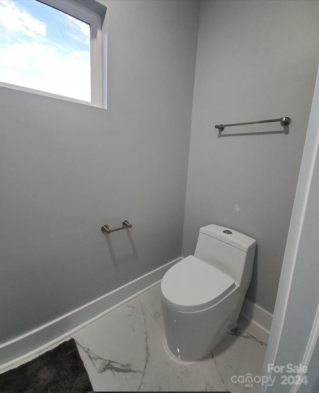 bathroom featuring toilet