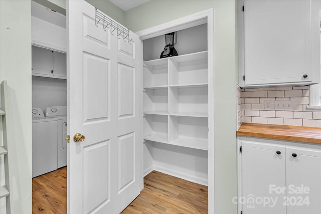 pantry featuring washing machine and dryer