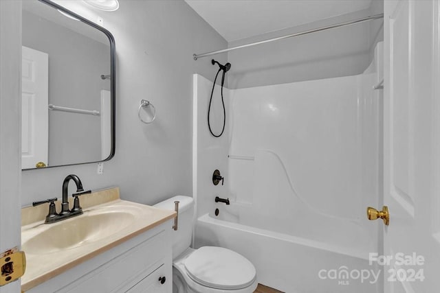 full bathroom featuring vanity, toilet, and tub / shower combination