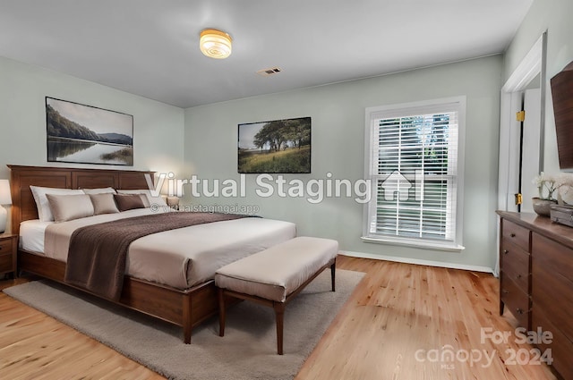 bedroom featuring light hardwood / wood-style flooring