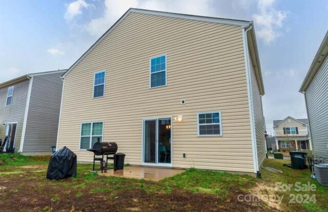 rear view of house with a patio area