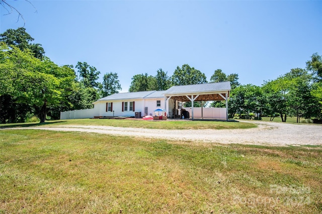 single story home featuring a front yard