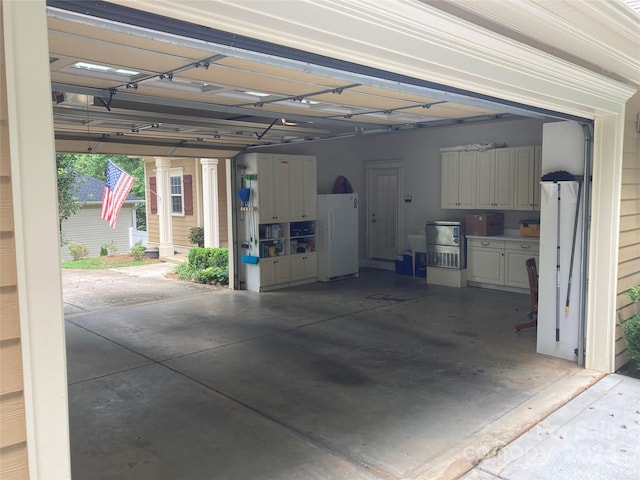 garage with white fridge