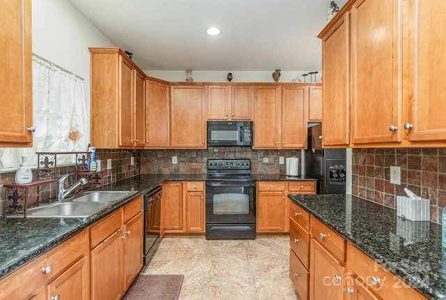 kitchen featuring sink, backsplash, black appliances, and dark stone countertops