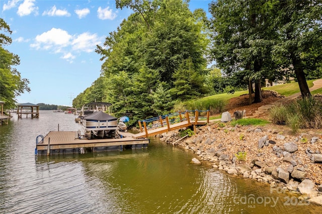 view of dock with a water view