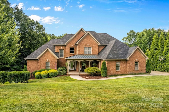 view of front of property with a front lawn and a porch