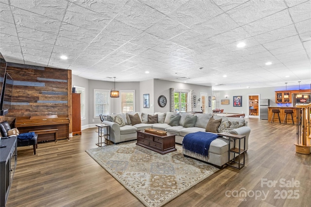 living room with hardwood / wood-style flooring