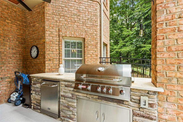 view of patio / terrace with a grill and area for grilling