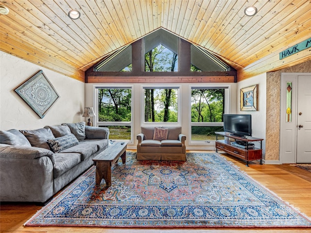 living room featuring a wealth of natural light, wood ceiling, and wood-type flooring