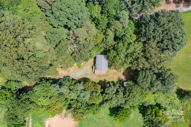 aerial view with a wooded view