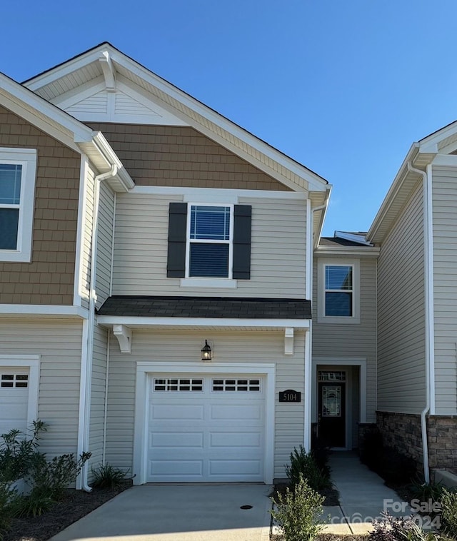 view of front of property featuring a garage