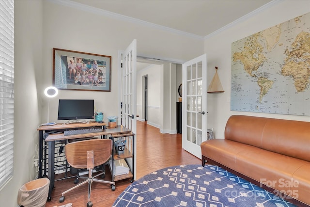 office featuring french doors, hardwood / wood-style flooring, and ornamental molding