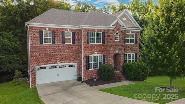 view of front of house featuring a garage and a front yard