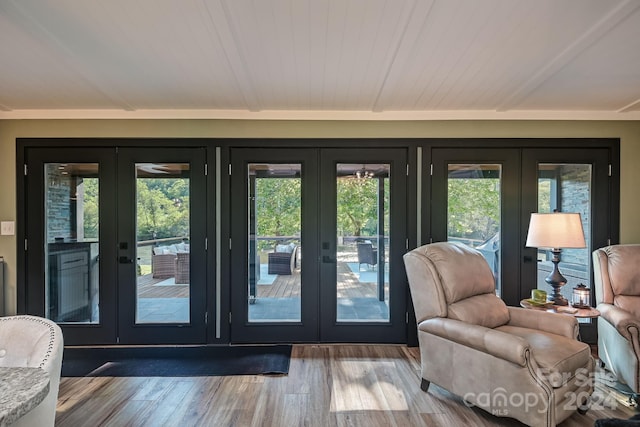 entryway featuring hardwood / wood-style floors and french doors