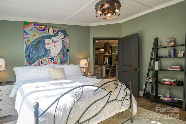 bedroom featuring hardwood / wood-style flooring