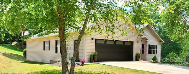5692 Marblestone Dr, Granite Falls, NC 28630 - view of front of house featuring driveway, a garage, and a front lawn
