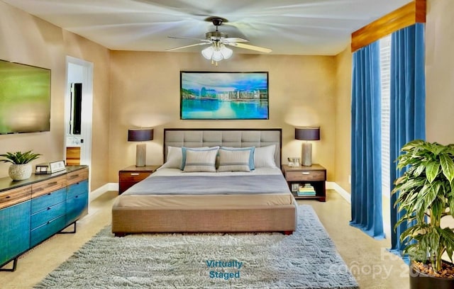 5692 Marblestone Dr, Granite Falls, NC 28630 - bedroom featuring baseboards, ensuite bath, carpet floors, and ceiling fan