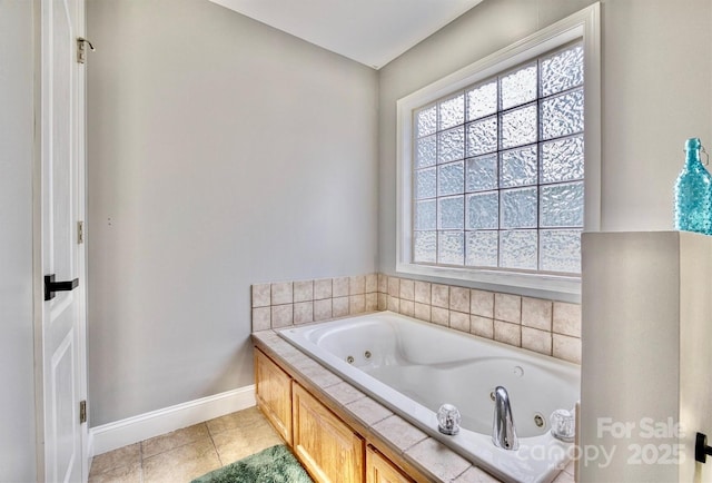 5692 Marblestone Dr, Granite Falls, NC 28630 - bathroom with baseboards, a tub with jets, and tile patterned flooring