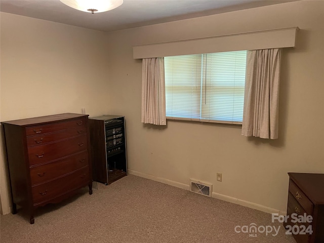 unfurnished bedroom with light carpet