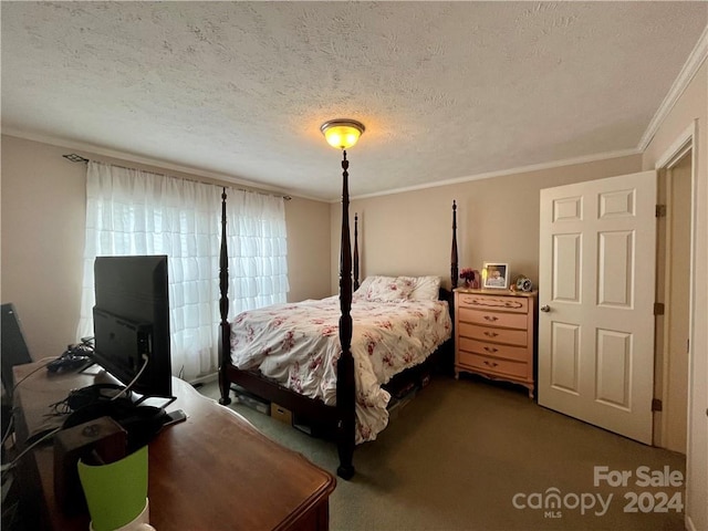 bedroom with carpet floors, ornamental molding, and a textured ceiling