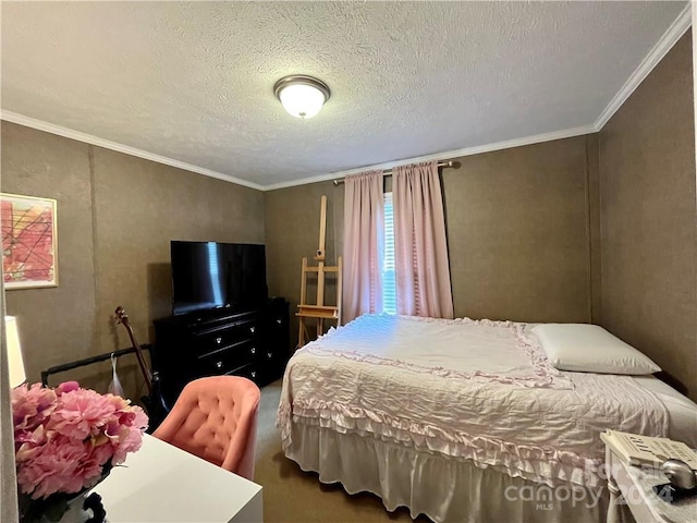 bedroom with a textured ceiling and crown molding