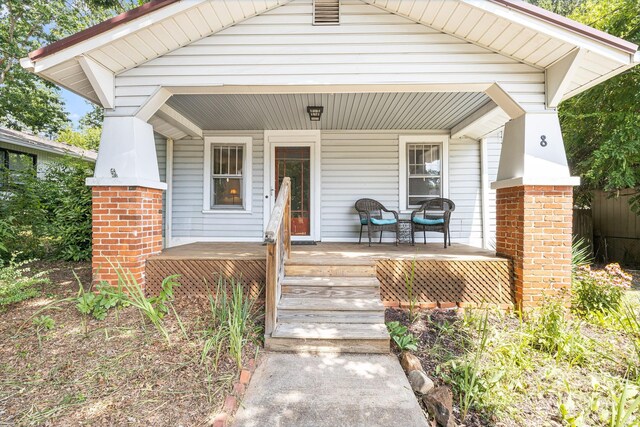 view of front of home featuring covered porch