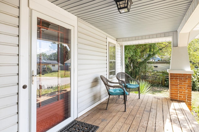 deck with covered porch