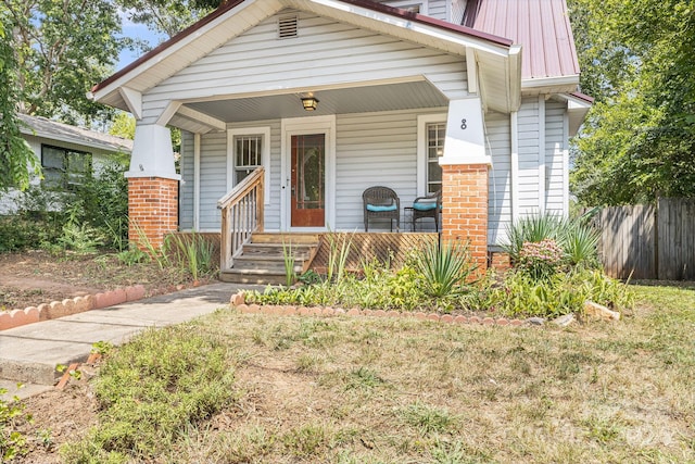 view of front of home featuring covered porch