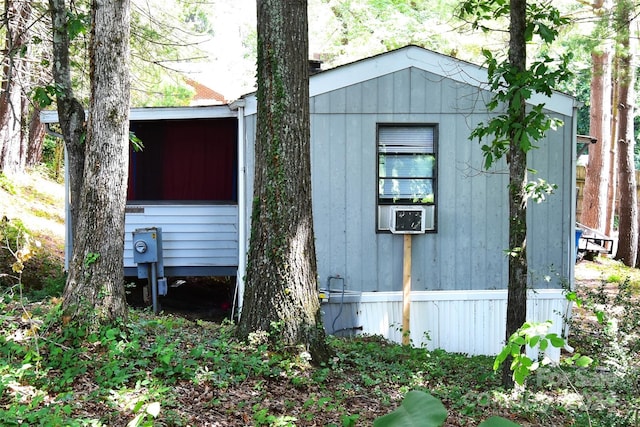 view of outbuilding with cooling unit