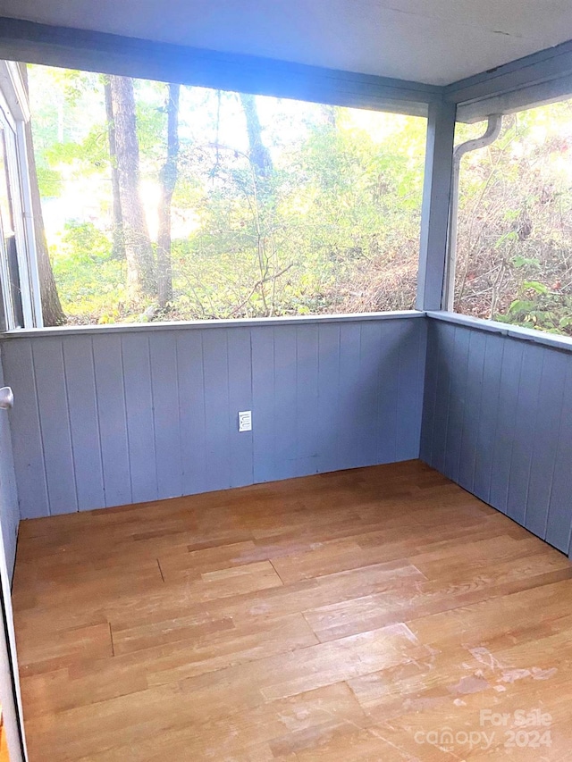 unfurnished sunroom with a healthy amount of sunlight