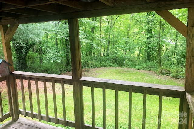 deck featuring a lawn