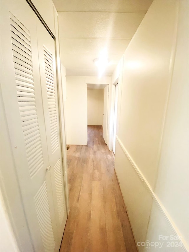 hallway featuring light wood-type flooring