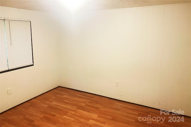 spare room featuring light wood-type flooring