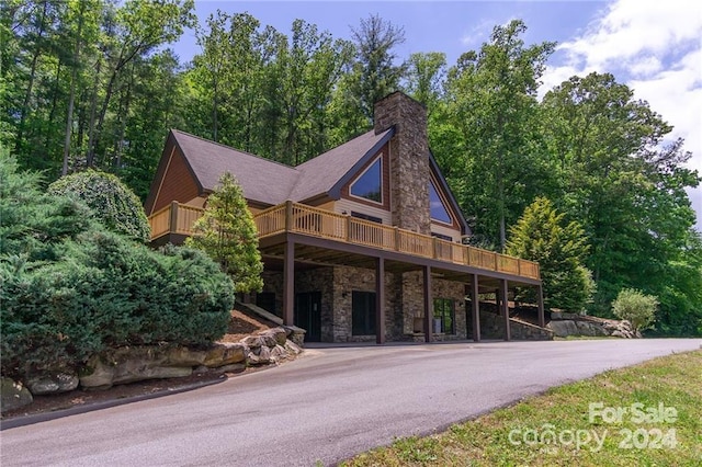 view of front of property featuring a deck