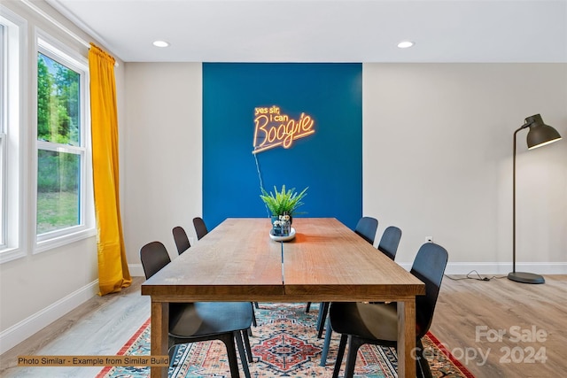 dining area with light wood-type flooring