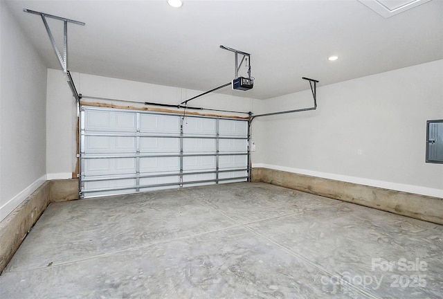 garage with electric panel and a garage door opener