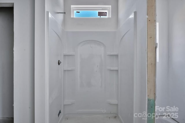 bathroom with a shower