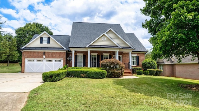 craftsman house featuring a front lawn and a garage