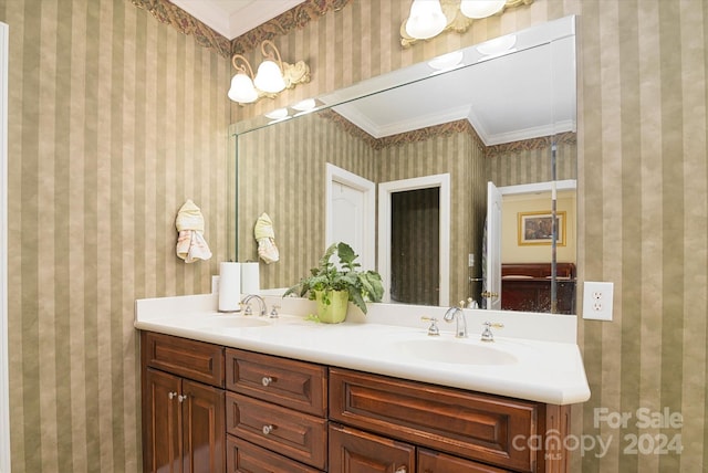 bathroom featuring vanity and crown molding