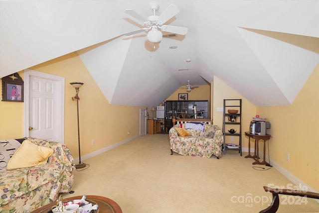 carpeted bedroom featuring ceiling fan and vaulted ceiling