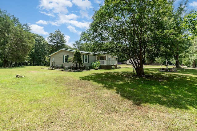 view of yard featuring a porch