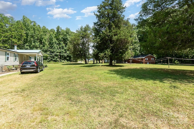 view of yard with volleyball court