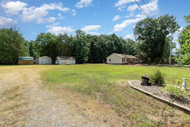 view of yard with a storage unit