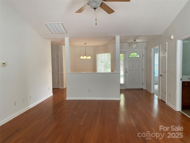 entryway featuring dark hardwood / wood-style flooring and ceiling fan with notable chandelier