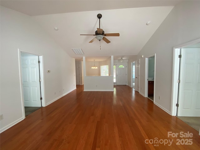 unfurnished living room with hardwood / wood-style flooring, vaulted ceiling, and ceiling fan