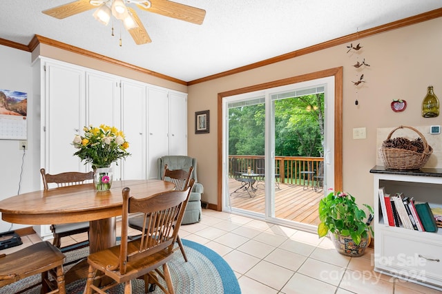 4299 Randleman Rd, Iron Station, NC 28080 - dining area featuring ornamental molding, light tile patterned floors, ceiling fan, and a textured ceiling